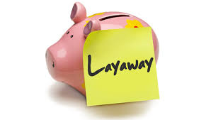 Piggy bank with a layaway sign - one possible idea for New Year's resolutions.
