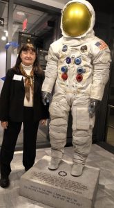 Pat next to life-sized space suit