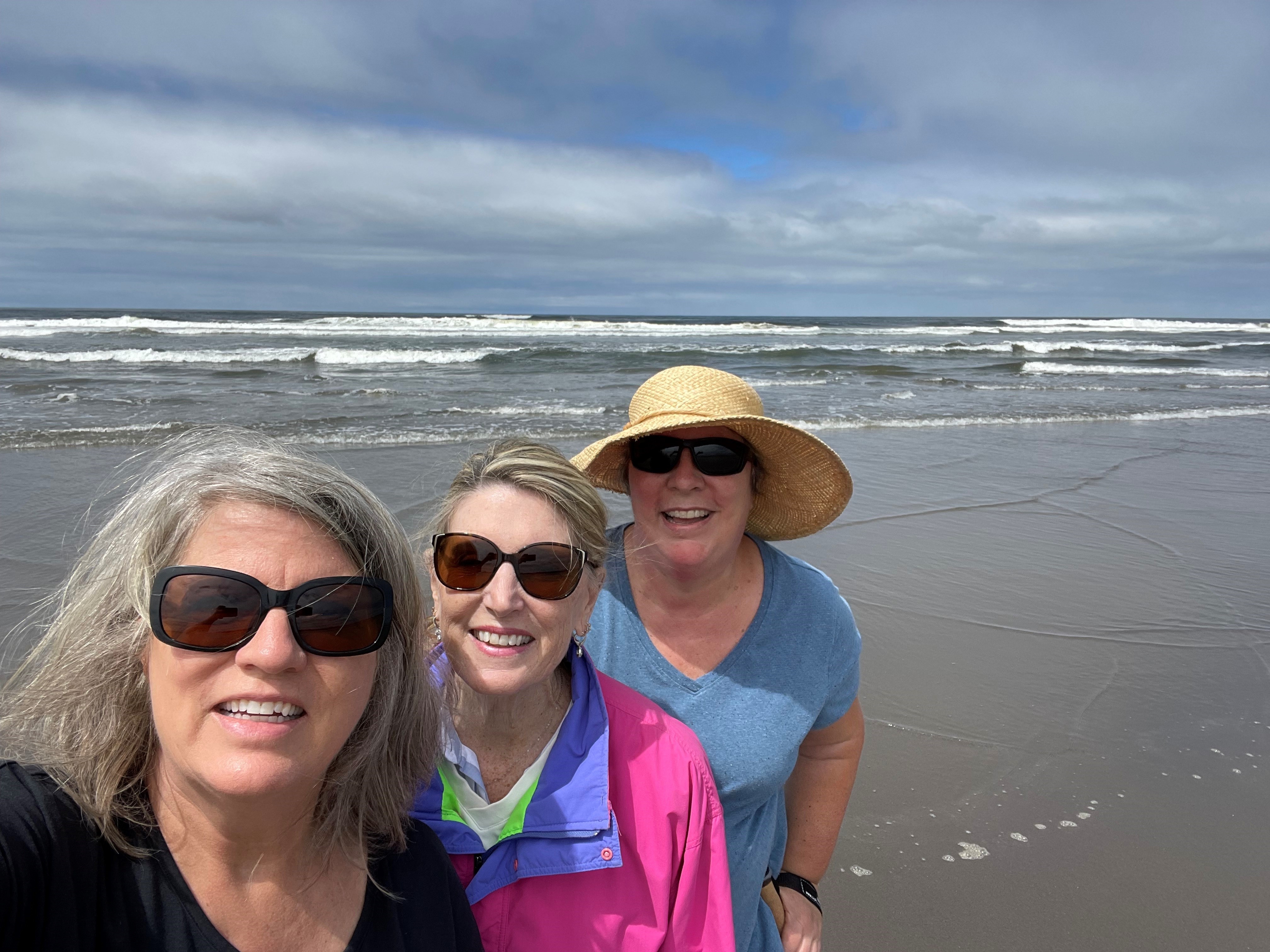 Kim and college friends talking about time to retire on the beach