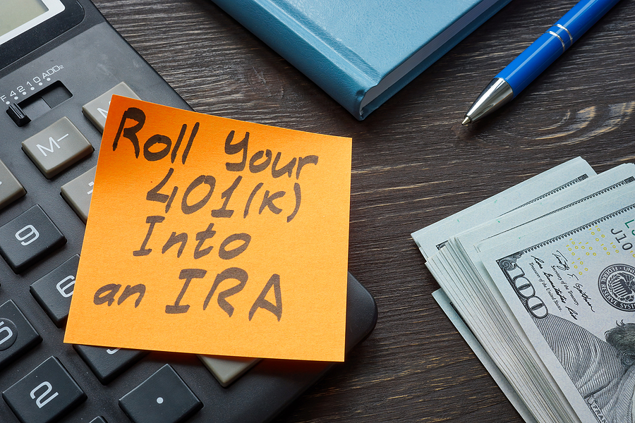 Image of an orange post-it with "roll your 401(k) into an IRA. Important message for women and money