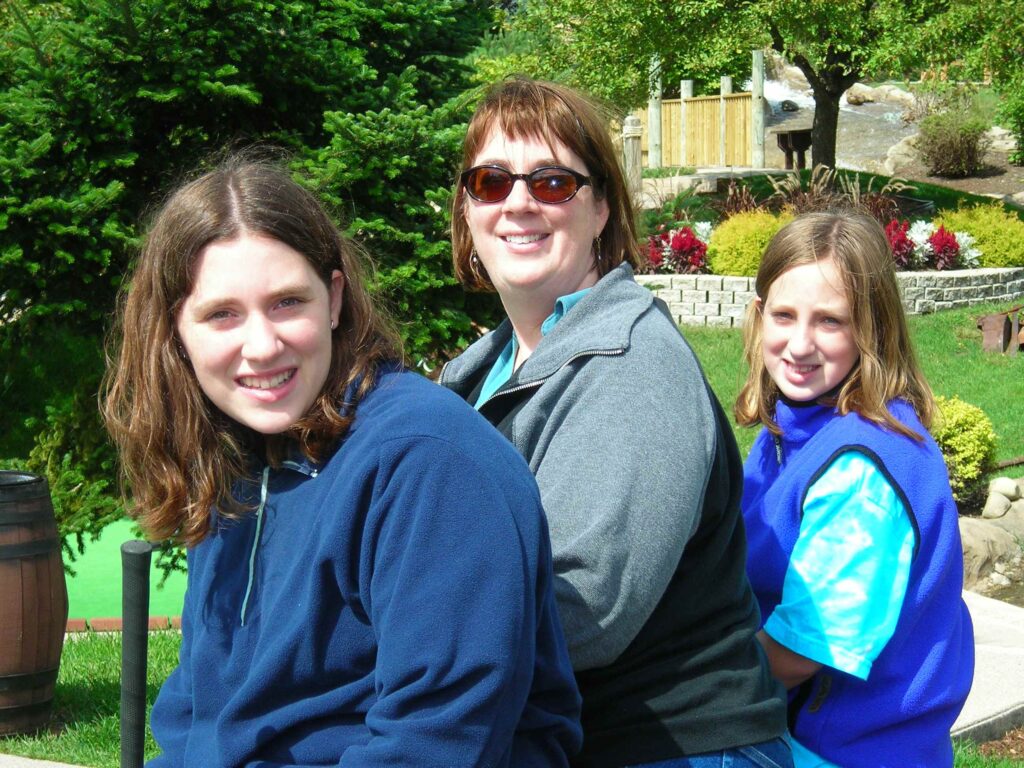 Marcia, owner of Mantell Retirement Consulting with her two kids in 2006