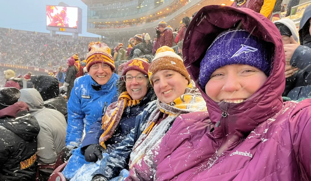 Marcia Mantell and family enjoying football game