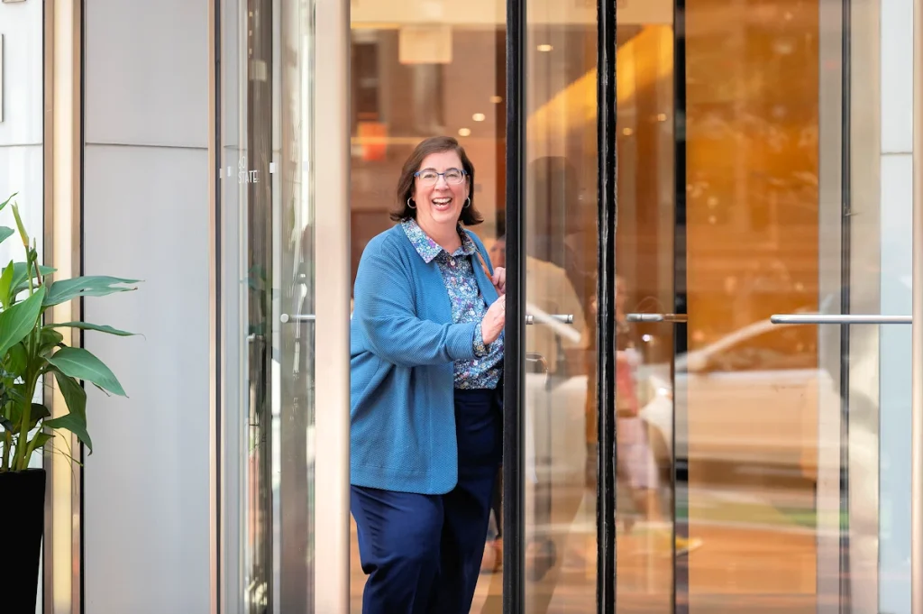 Retirement expert Marcia Mantell existing the office